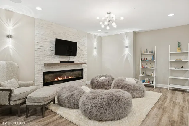 a front view of a house with a yard table and chairs
