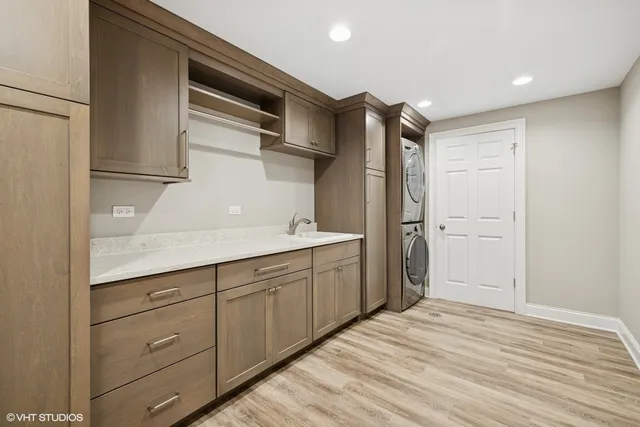 a picture of a bathroom with a white wall