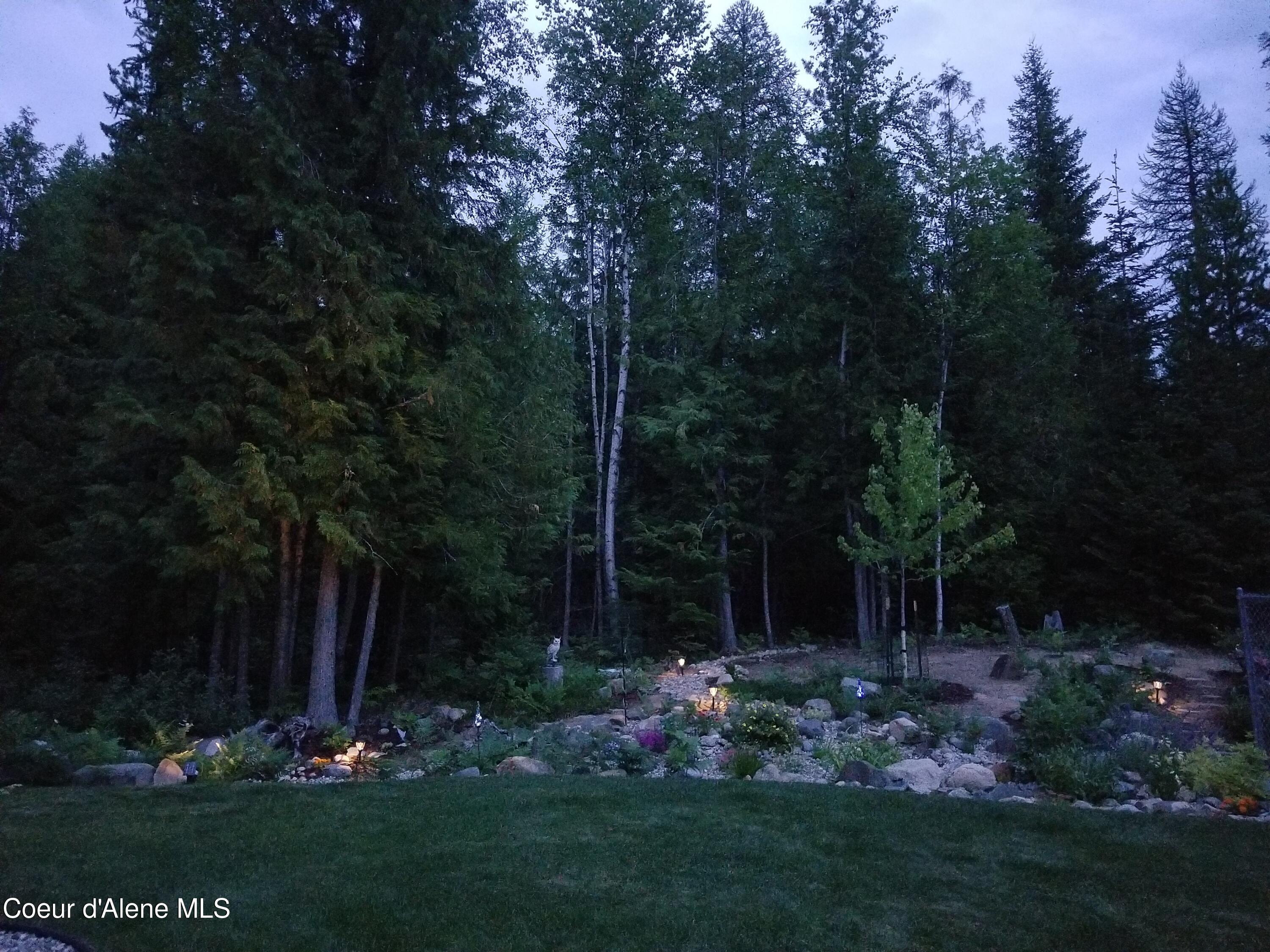 518 High Road Sandpoint, ID 83864 - Photo 46 of 57 Night time rock &flower garden