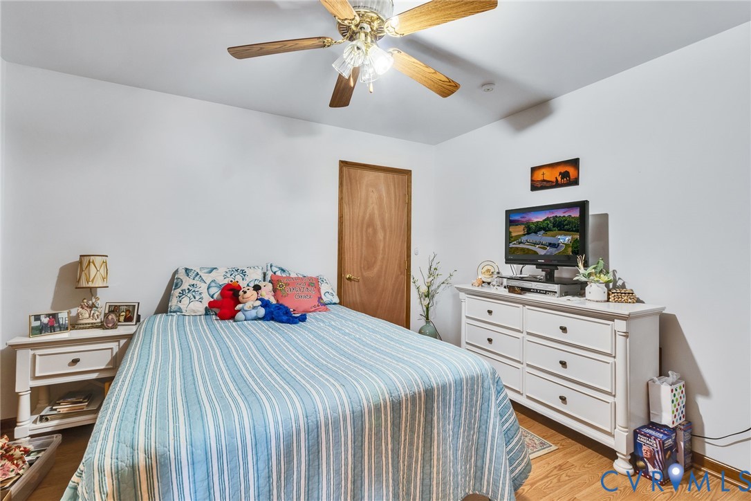 4400 Hacks Neck Road Heathsville, VA 22473 - Photo 39 of 78 a bedroom with a bed and a dresser in it
