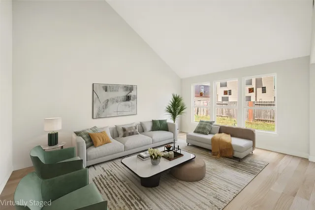 a living room with furniture and a couch