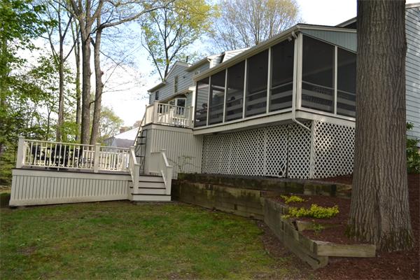 19 Maugus Hill Road Wellesley, MA 02481 - Photo 18 of 19 a front view of a house with a yard
