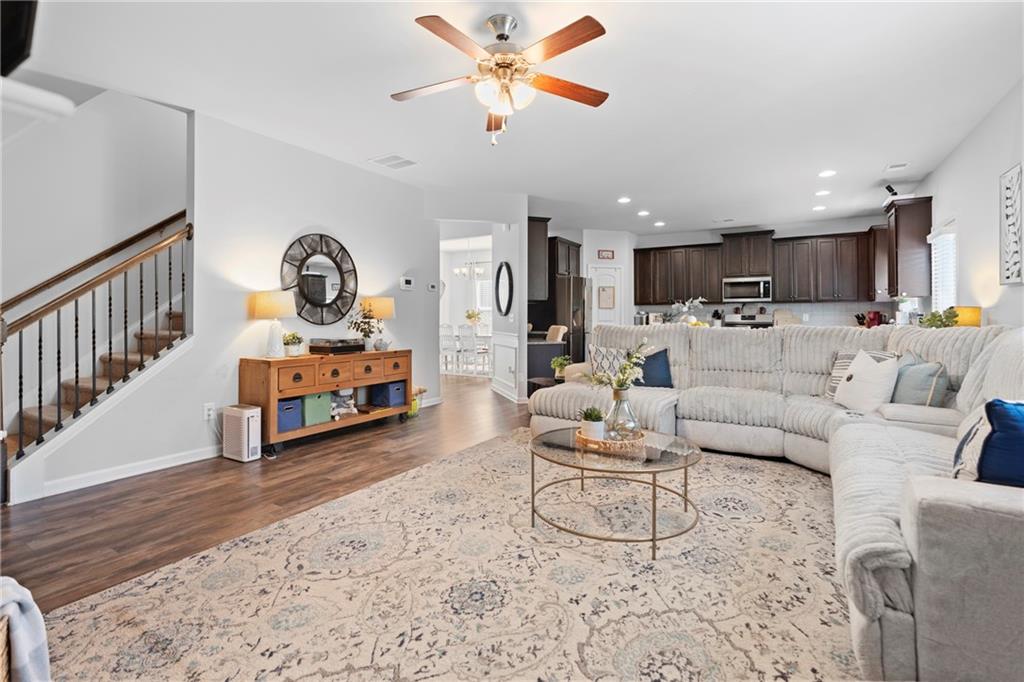 511 A Autumn Echo Canton, GA 30114 - Photo 14 of 39 a living room with furniture and a flat screen tv