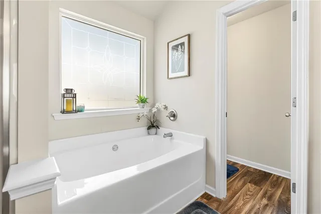 a bathroom with a sink double vanity and a mirror