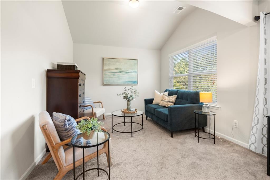 511 A Autumn Echo Canton, GA 30114 - Photo 19 of 39 a living room with furniture and a window