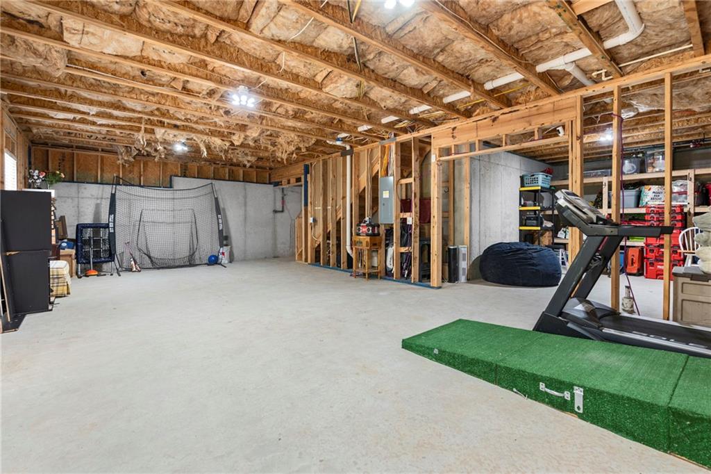 511 A Autumn Echo Canton, GA 30114 - Photo 27 of 39 a view of a room with gym equipment