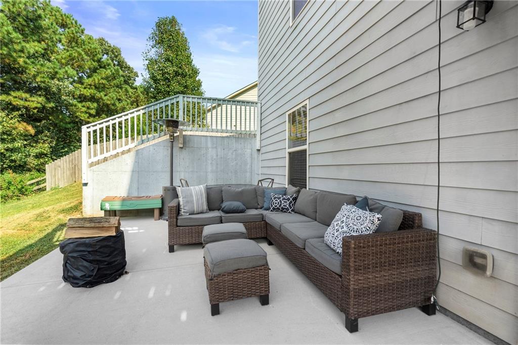 511 A Autumn Echo Canton, GA 30114 - Photo 29 of 39 a view of a couches in the patio