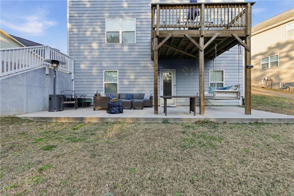 511 A Autumn Echo Canton, GA 30114 - Photo 32 of 39 a view of a house with a patio