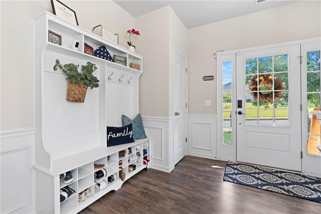 511 A Autumn Echo Canton, GA 30114 - Photo 5 of 39 a view of an entryway with wooden floor