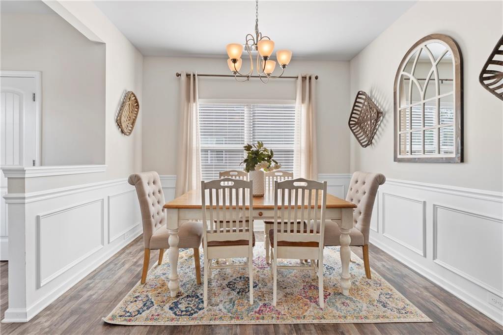 511 A Autumn Echo Canton, GA 30114 - Photo 6 of 39 a view of a dining room with furniture window and wooden floor