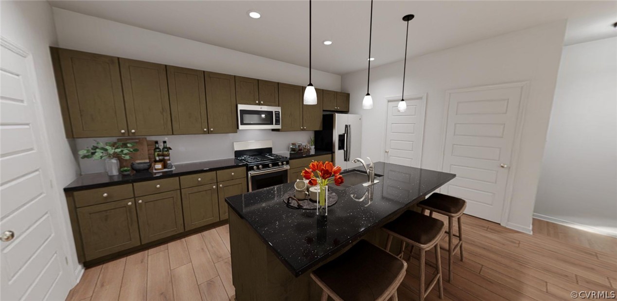 a kitchen with a dining table chairs and a refrigerator