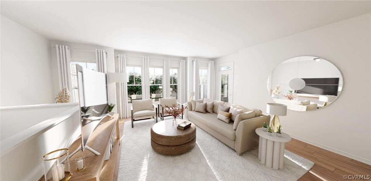 4107 Next Level Trace Midlothian, VA 23112 - Photo 5 of 39 a living room with furniture and a flat screen tv