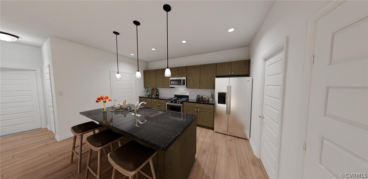 4107 Next Level Trace Midlothian, VA 23112 - Photo 10 of 39 a kitchen with refrigerator cabinets dining table and chairs