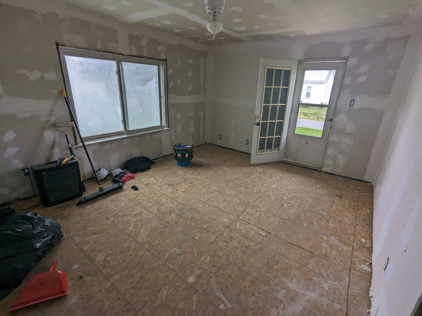 108 3rd Street Buckley, IL 60918 - Photo 9 of 23 an empty room with windows