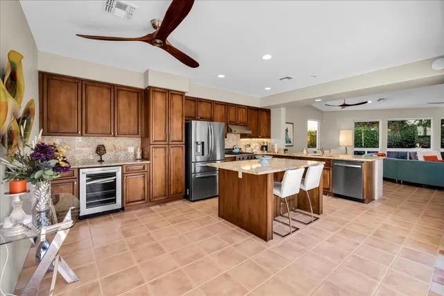 a kitchen with cabinets a sink and a stove