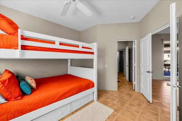 a bedroom with a bed and a closet