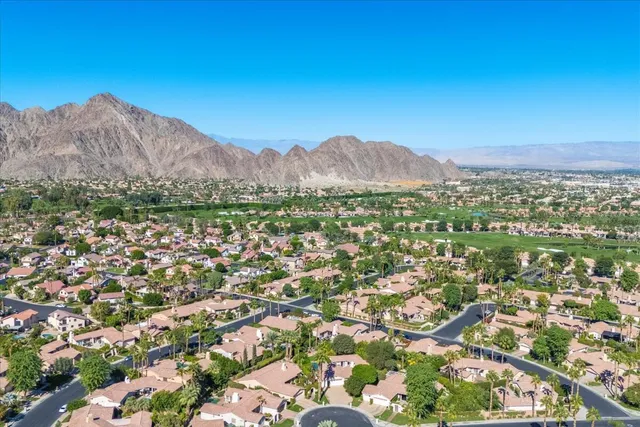 an aerial view of residential house and outdoor space