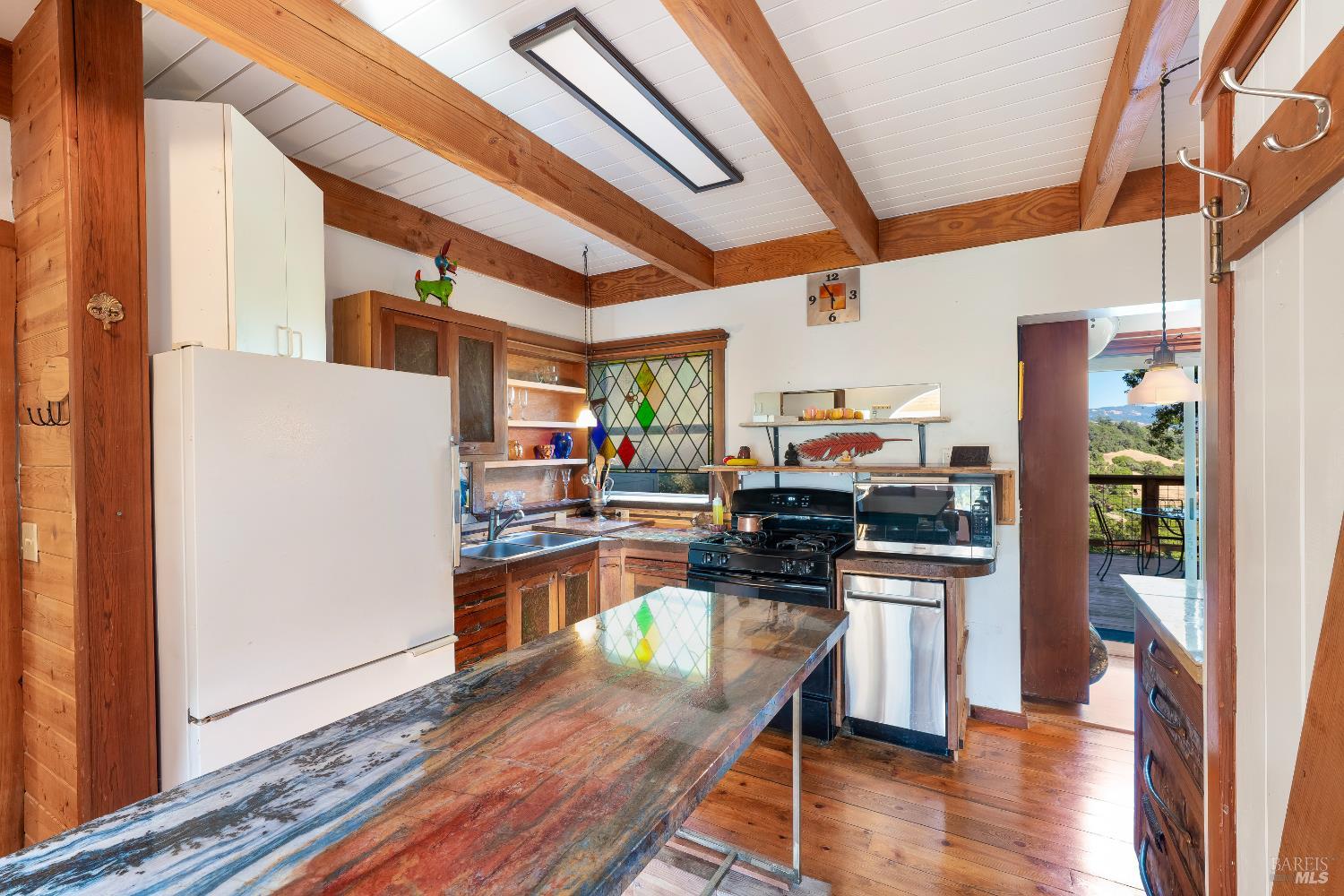 13635 Denmark Creek Road Boonville, CA 95415 - Photo 17 of 75 a kitchen with stainless steel appliances granite countertop a stove and a refrigerator