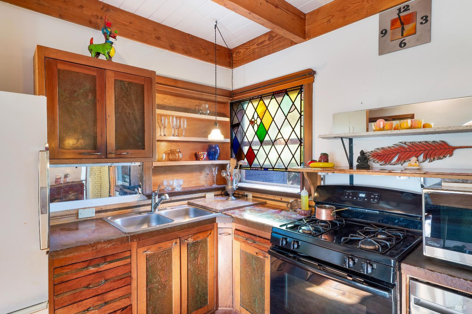 13635 Denmark Creek Road Boonville, CA 95415 - Photo 18 of 75 a kitchen with stainless steel appliances granite countertop a stove a sink and a cabinets