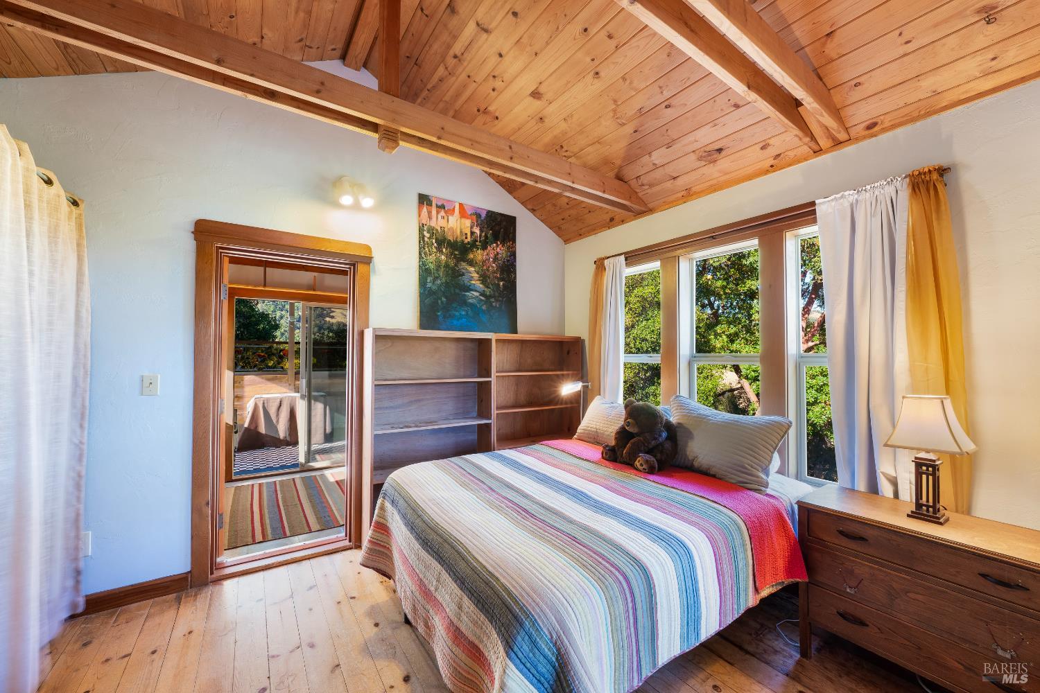 13635 Denmark Creek Road Boonville, CA 95415 - Photo 24 of 75 a bedroom with a bed and a large window