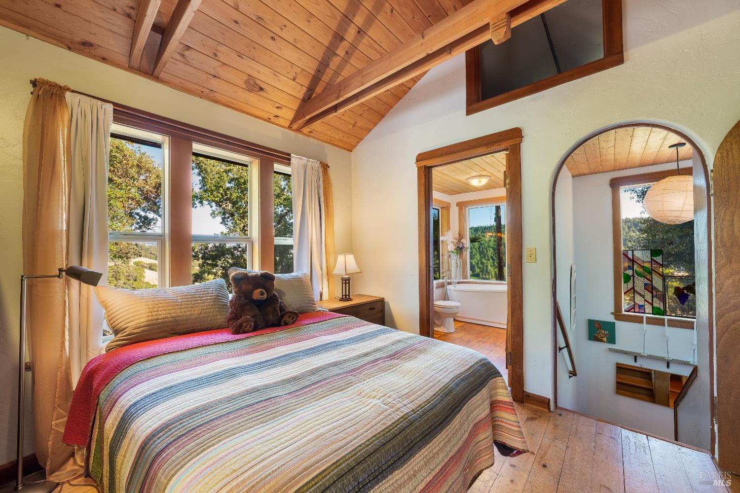 13635 Denmark Creek Road Boonville, CA 95415 - Photo 25 of 75 a bedroom with bed and wooden floor