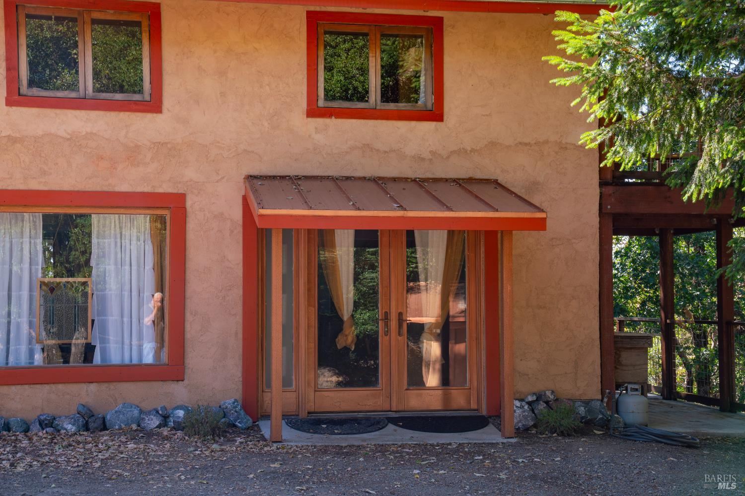 13635 Denmark Creek Road Boonville, CA 95415 - Photo 33 of 75 a front view of a house with a porch