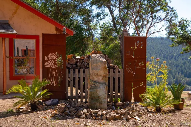 a living room with furniture wooden floor and window