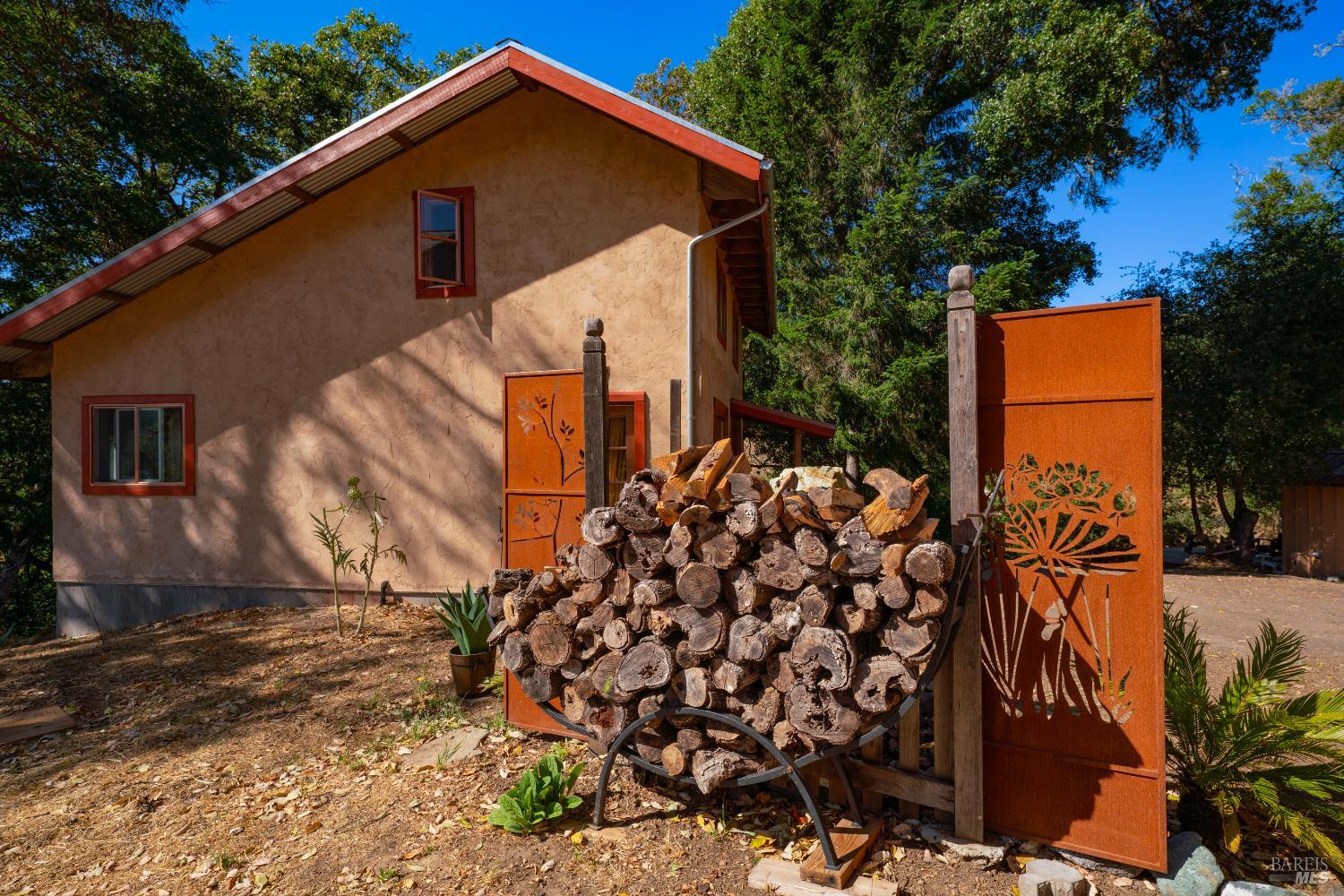 13635 Denmark Creek Road Boonville, CA 95415 - Photo 55 of 75 a view of a house with a yard