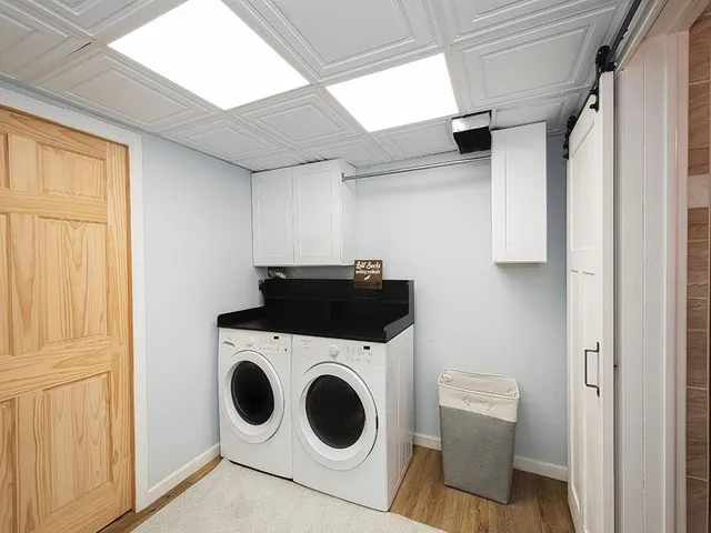 a utility room with dryer and washer