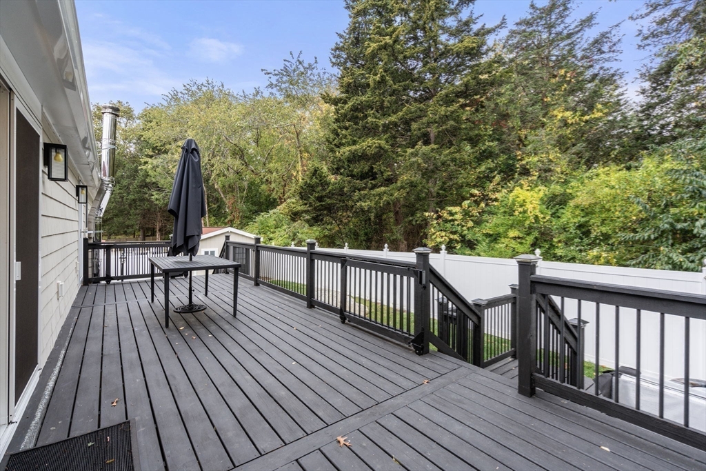 188 Atlantic Street Gloucester, MA 01930 - Photo 22 of 29 a view of balcony with wooden floor and outdoor seating