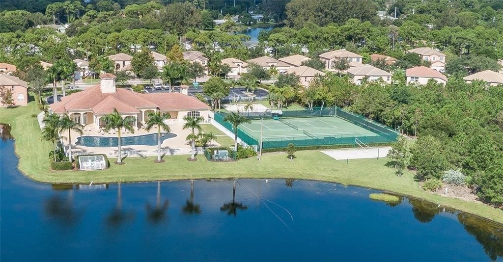 5825 Spanish River Road Fort Pierce, FL 34951 - Photo 26 of 36 an aerial view of residential houses with outdoor space and river