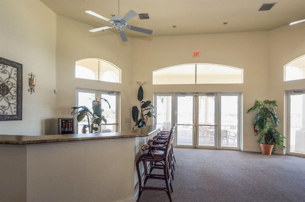 5825 Spanish River Road Fort Pierce, FL 34951 - Photo 30 of 36 a view of a livingroom with furniture window and a chandelier