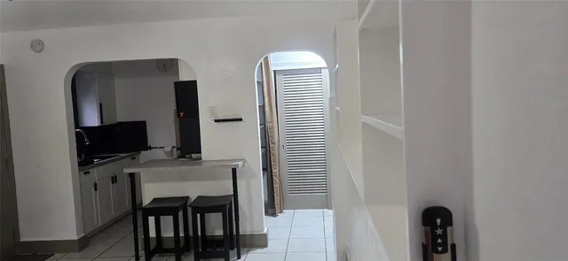 a room with furniture and window