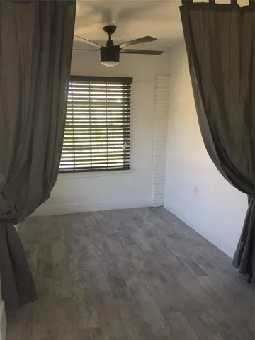 a view of a back yard of the house