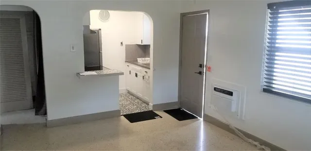 a kitchen with a cabinets and a stove