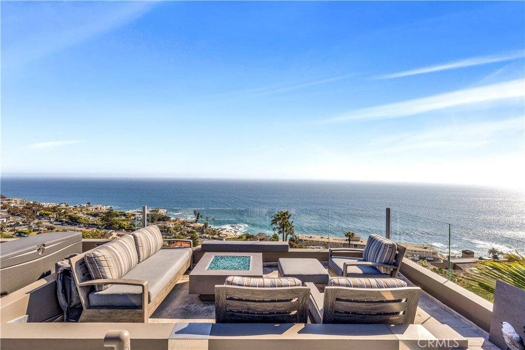 a view of a balcony with ocean view