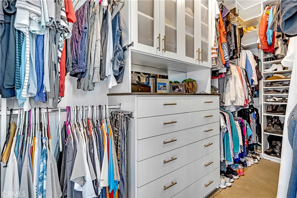 31411 Ceanothus Drive Laguna Beach, CA 92651 - Photo 24 of 60 a view of walk in closet with clothes