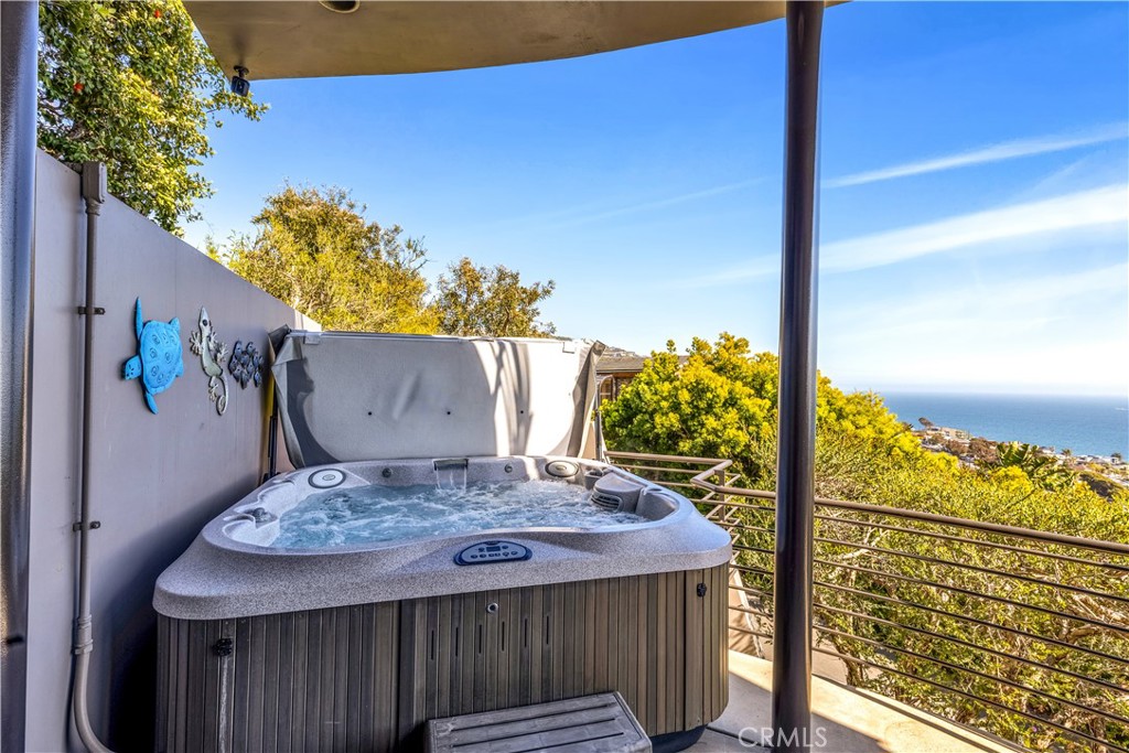 31411 Ceanothus Drive Laguna Beach, CA 92651 - Photo 39 of 60 a view of a balcony with chair and table