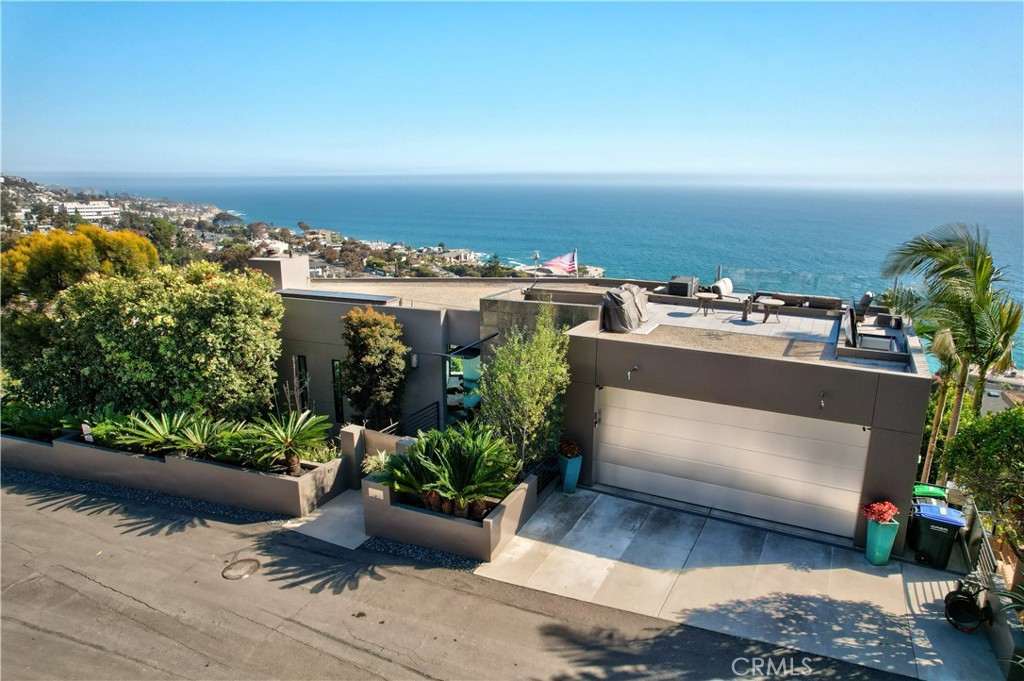 31411 Ceanothus Drive Laguna Beach, CA 92651 - Photo 4 of 60 a view of a terrace with chairs and potted plants