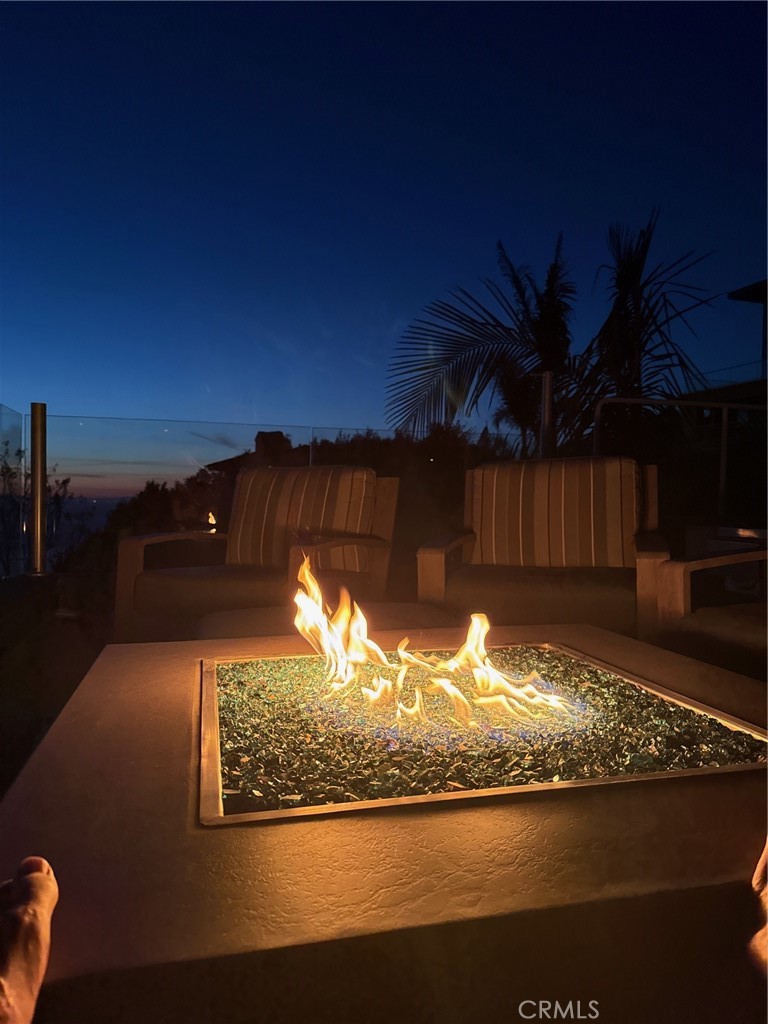 31411 Ceanothus Drive Laguna Beach, CA 92651 - Photo 54 of 60 a view of a fireplace in a yard