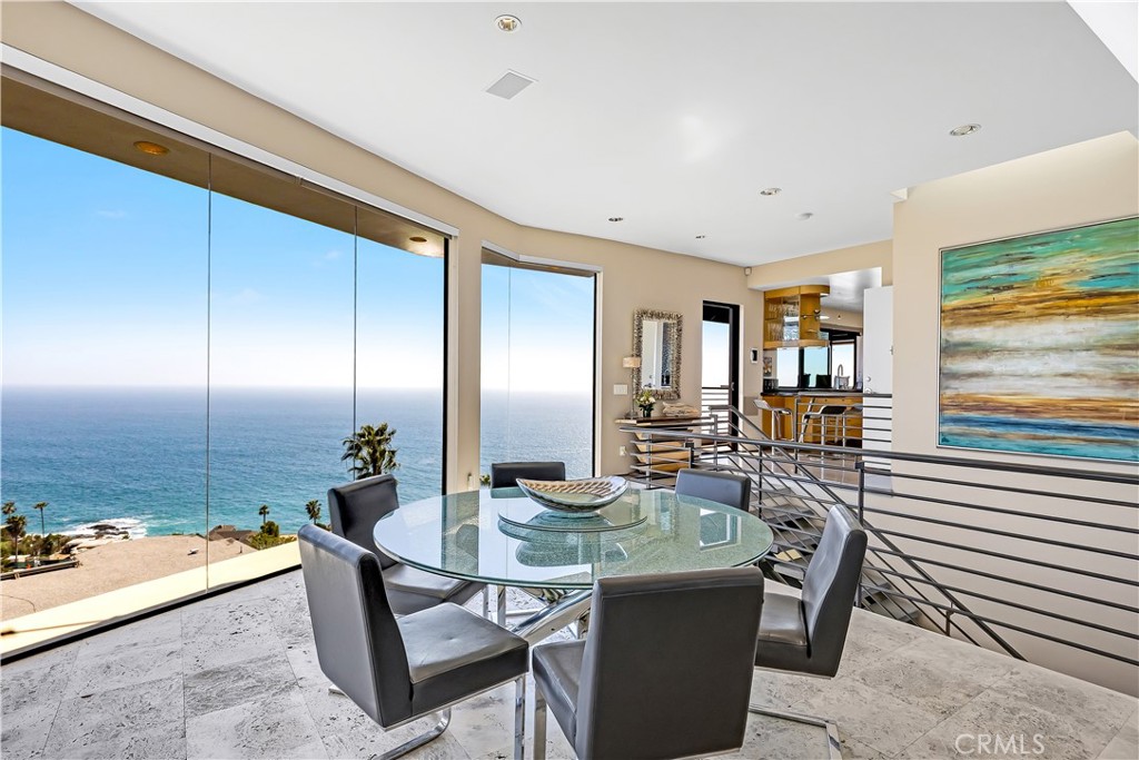 31411 Ceanothus Drive Laguna Beach, CA 92651 - Photo 7 of 60 a dining room with furniture and wooden floor