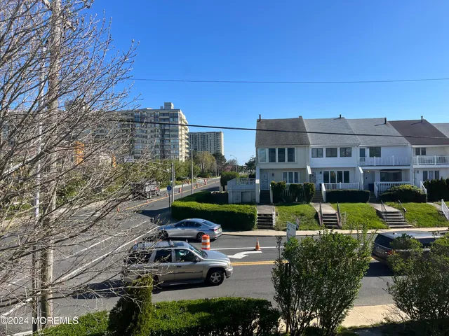 a view of a house with a garden