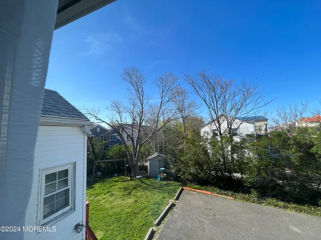 a view of a backyard with plants