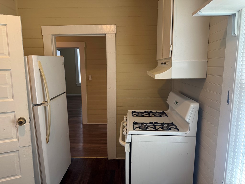 1312 22nd Street Columbus, GA 31901 - Photo 11 of 11 a kitchen with a refrigerator and a stove