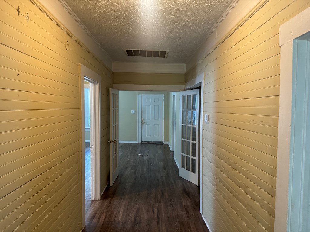 1312 22nd Street Columbus, GA 31901 - Photo 8 of 11 a view of a hallway with wooden floor