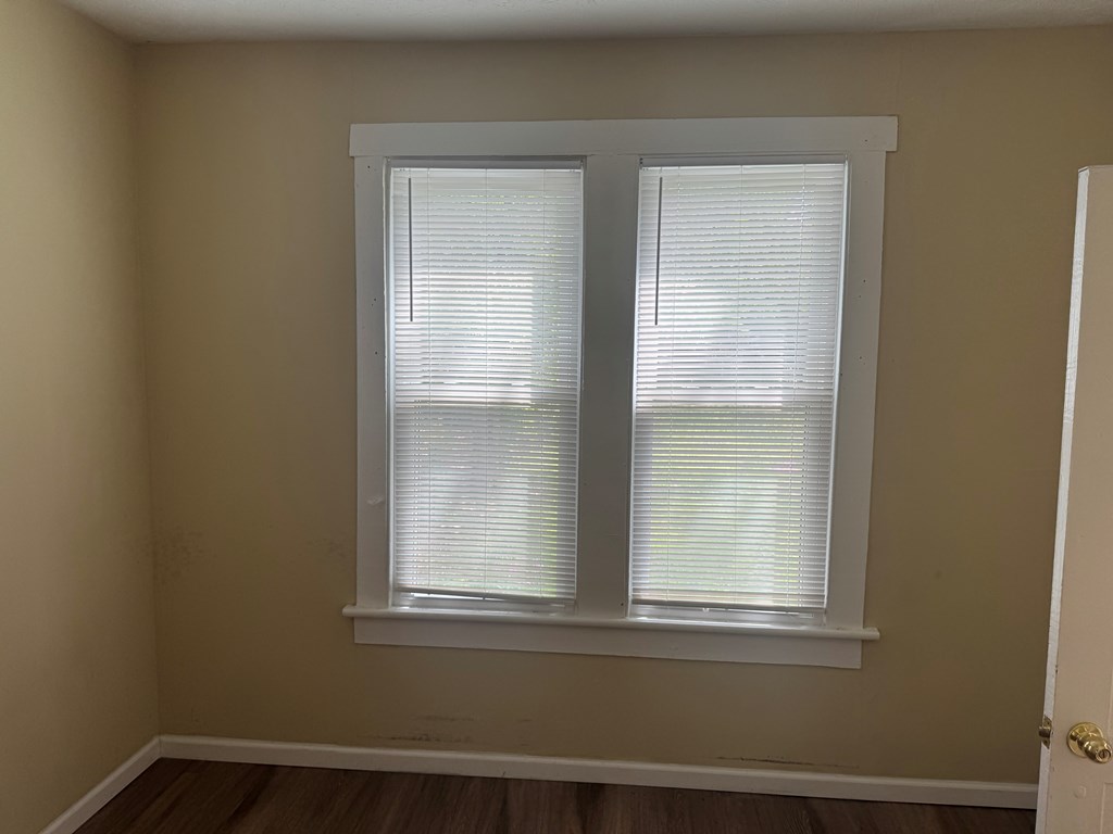 1312 22nd Street Columbus, GA 31901 - Photo 9 of 11 a view of empty room with window