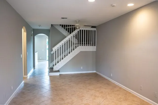 a view of an entryway with wooden floor