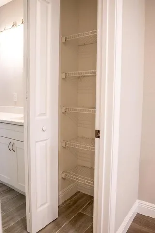 a bathroom with a glass shower door