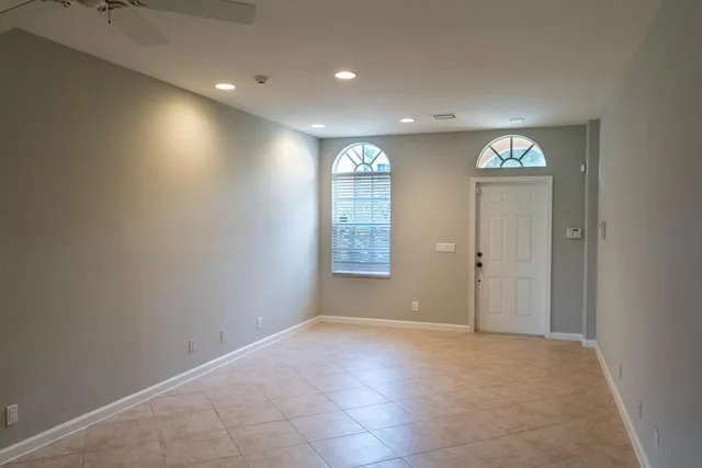 a view of an empty room and window