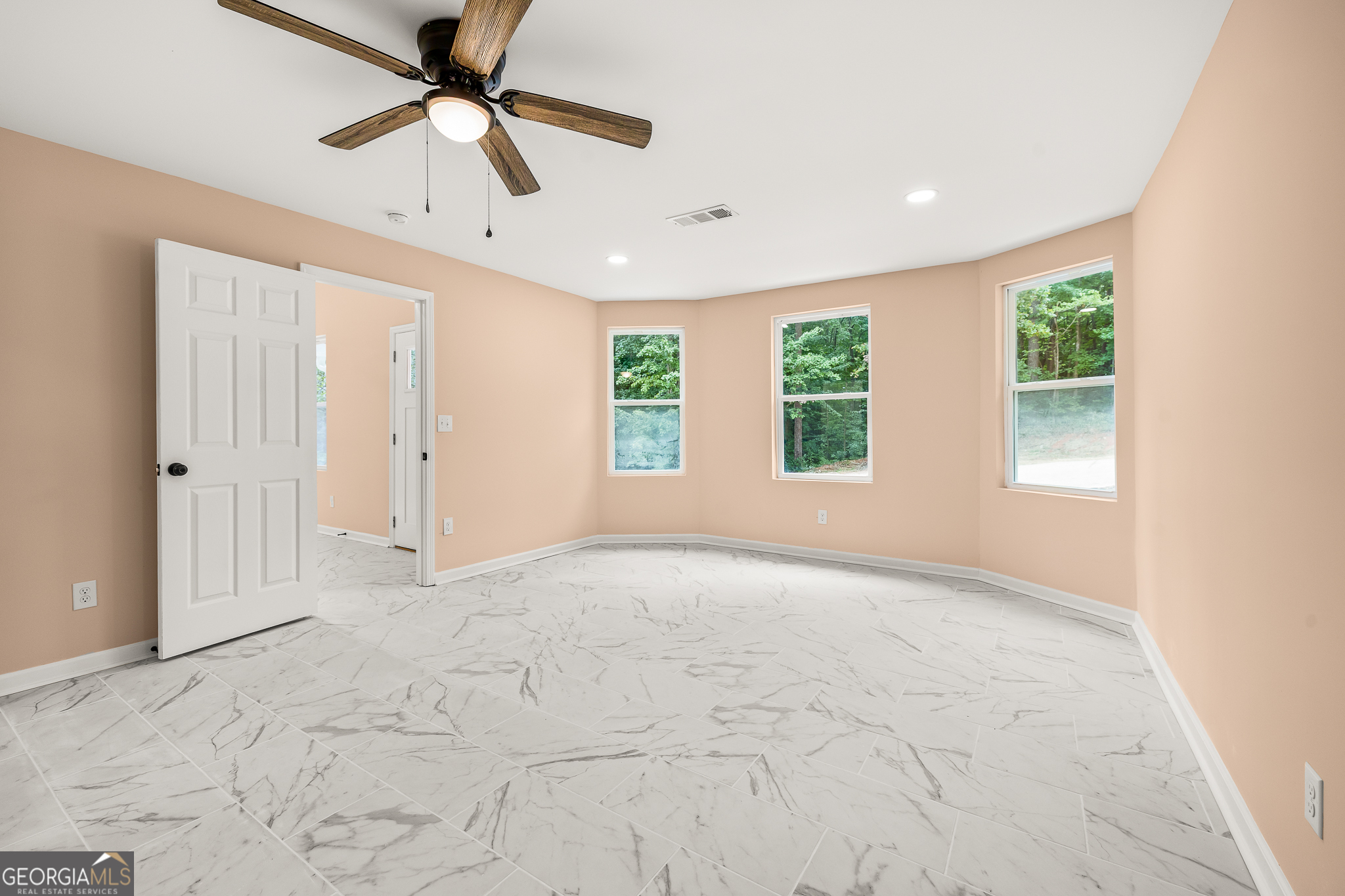 596 Watson Street Toccoa, GA 30577 - Photo 11 of 25 a view of an empty room with a window